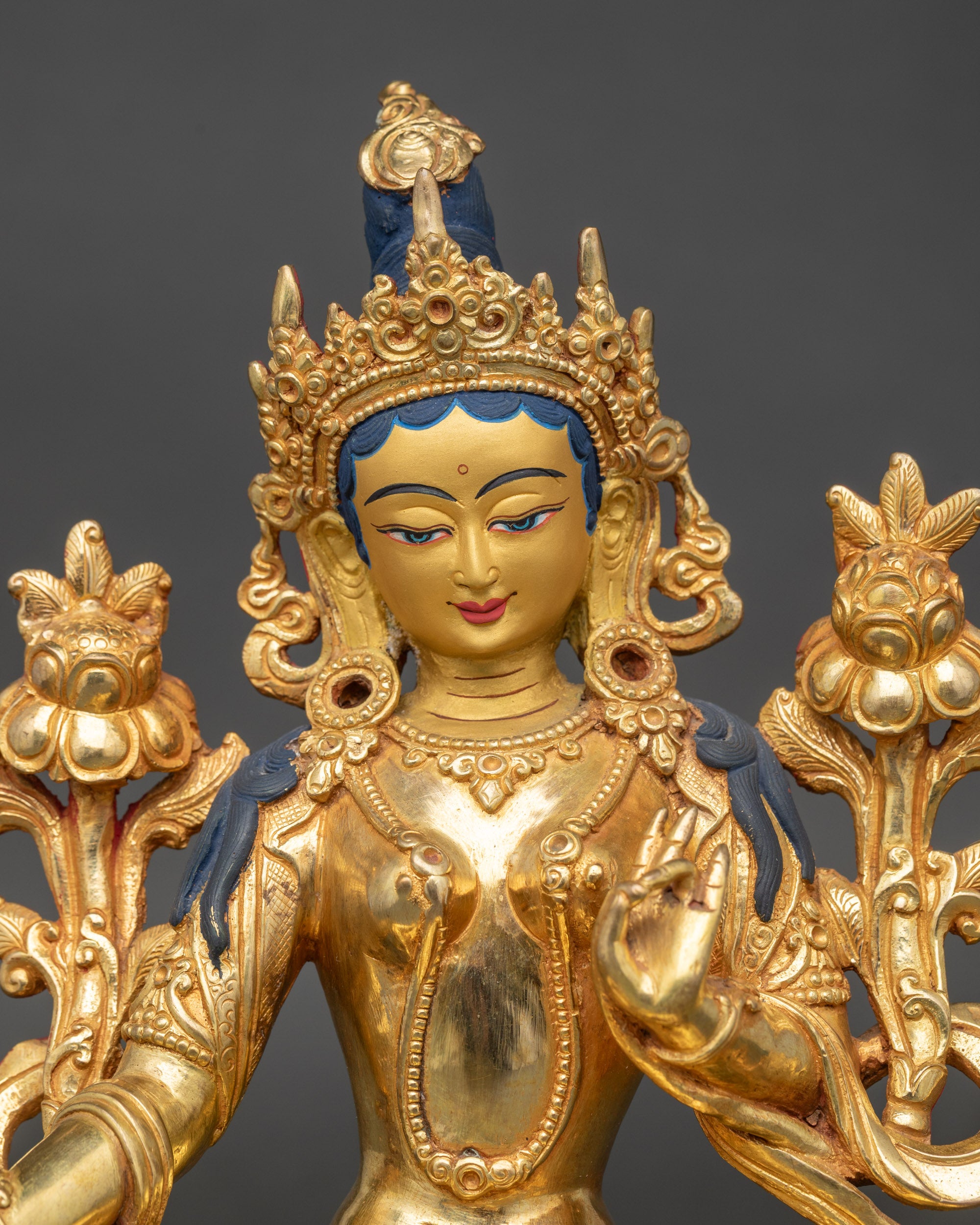 Green Tara statue regular close-up showing intricate crown and lotus seat details
