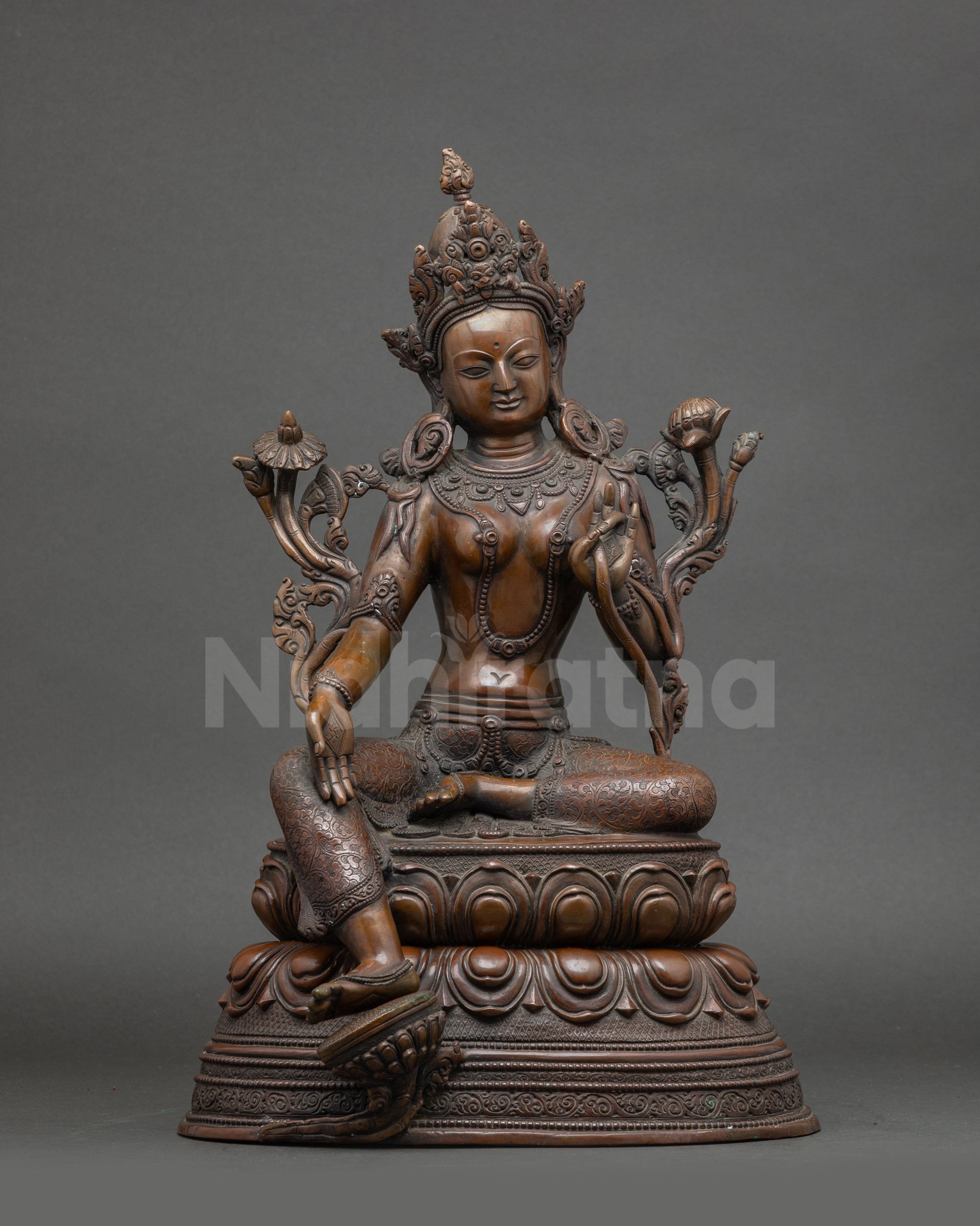 Green Tara statue seated on double lotus, Nepalese copper with gold accents
