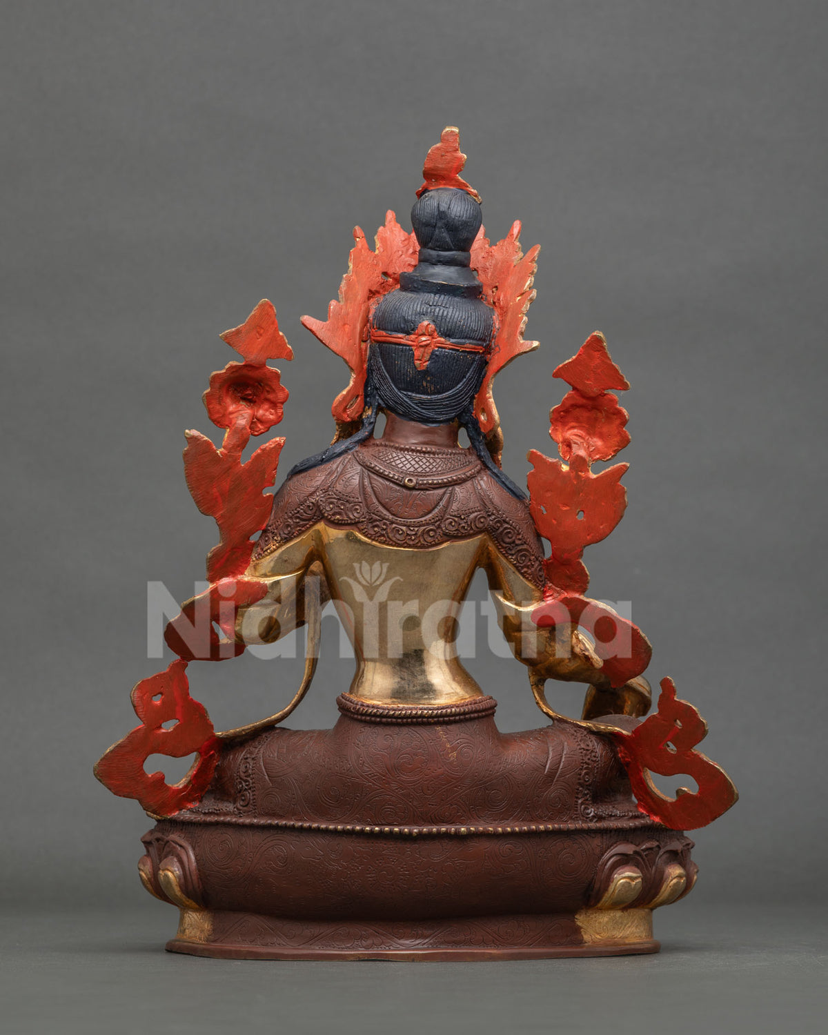 Green Tara statue back view gold gilded copper Newari craftsmanship.