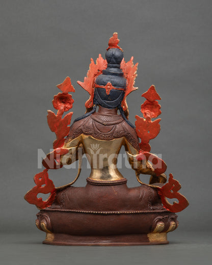Green Tara statue back view gold gilded copper Newari craftsmanship.