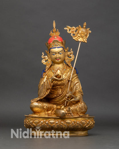 Guru Norlha statue gold fire gilded copper Buddhist wealth deity on lotus throne