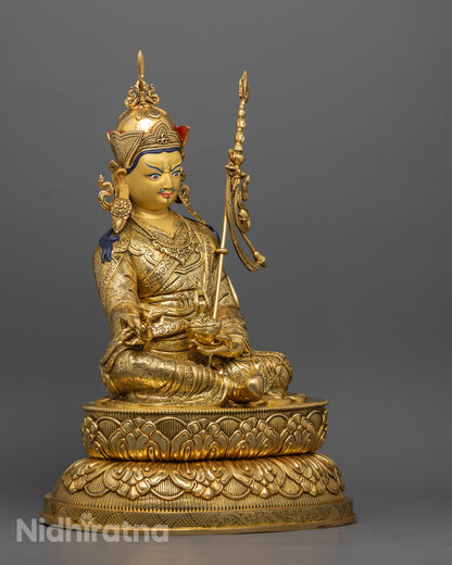 Guru Rinpoche Padmasambhava statue | Tibetan Buddhist figure | lotus-born master, Vajrayana guru, tantric meditation teacher, holding vajra and kapala, seated on lotus throne, rich traditional attire, Himalayan Buddhist icon.