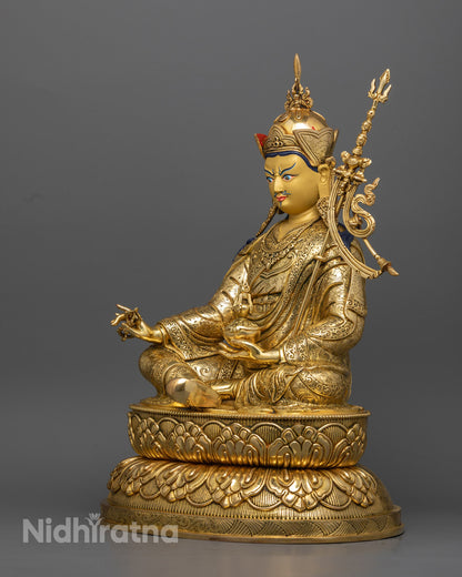 Guru Rinpoche Padmasambhava statue | Tibetan Buddhist figure | lotus-born master, Vajrayana guru, tantric meditation teacher, holding vajra and kapala, seated on lotus throne, rich traditional attire, Himalayan Buddhist icon.