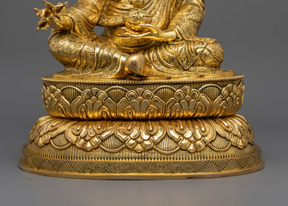 Guru Rinpoche Padmasambhava statue | Tibetan Buddhist figure | lotus-born master, Vajrayana guru, tantric meditation teacher, holding vajra and kapala, seated on lotus throne, rich traditional attire, Himalayan Buddhist icon.