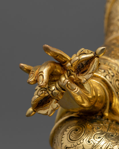 Guru Rinpoche Padmasambhava statue | Tibetan Buddhist figure | lotus-born master, Vajrayana guru, tantric meditation teacher, holding vajra and kapala, seated on lotus throne, rich traditional attire, Himalayan Buddhist icon.