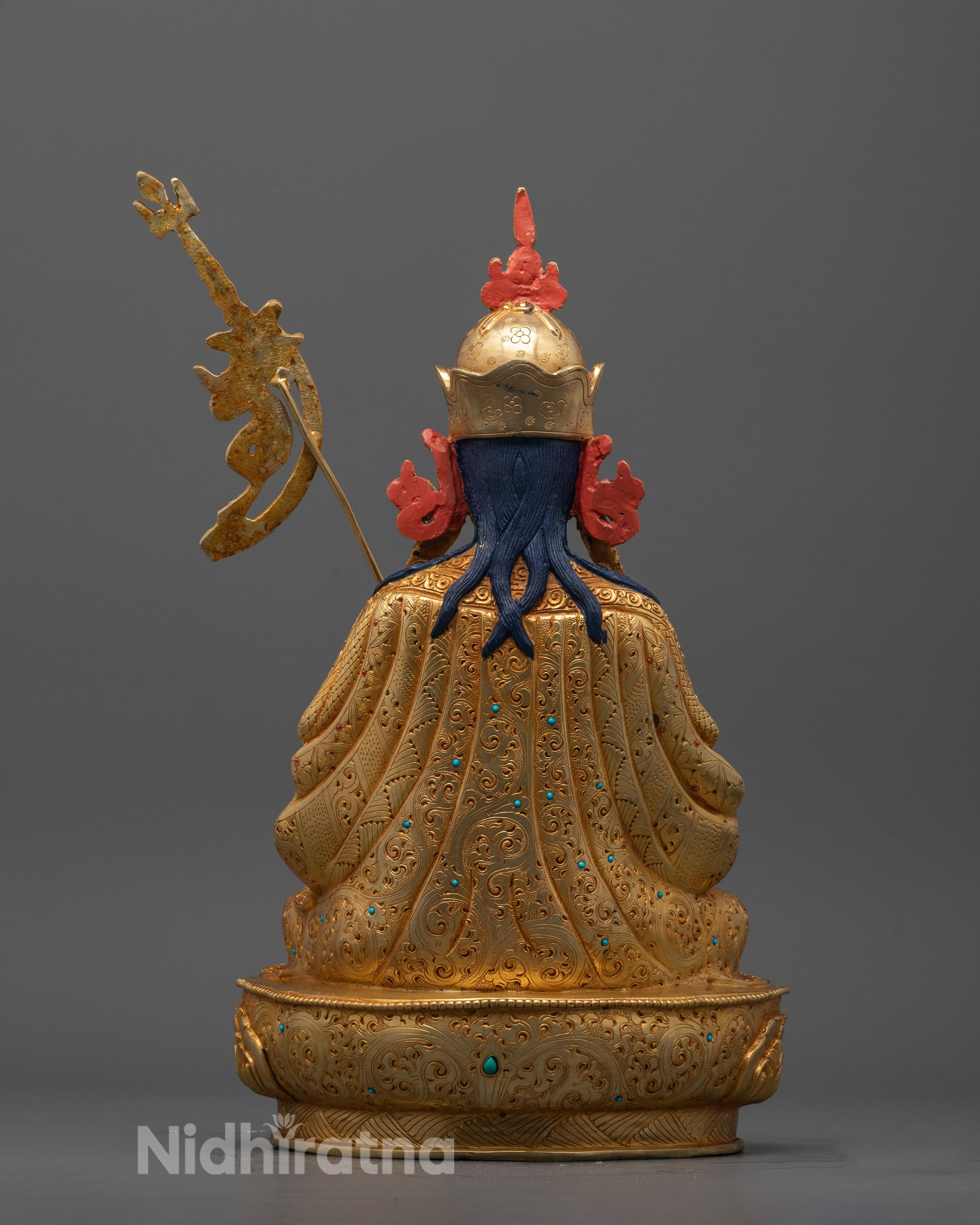 Back view highlighting the consecration chamber and flowing robe details

