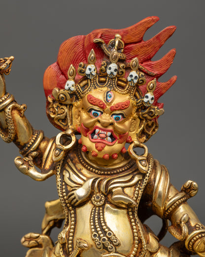 Guru Dragpo Statue close up showing gold-gilded face and intricate robes