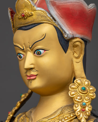 Guru Padmasambhava Statue detailed side close up with semi-wrathful gaze