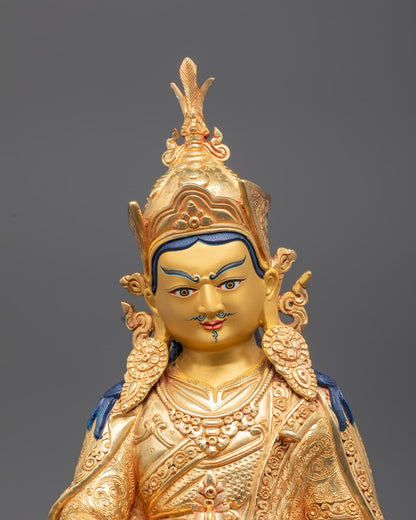 Guru Padmasambhava’s 24k gold-gilded face and intricately carved five-leaf crown – handcrafted Tibetan Buddhist statue for meditation and devotion.