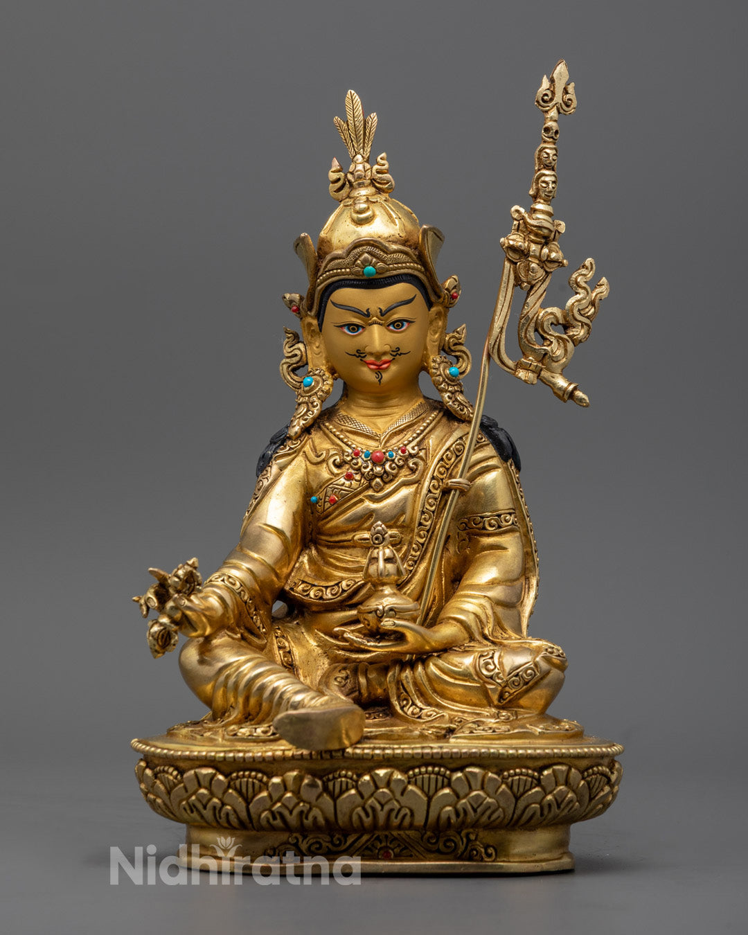 Guru Rinpoche Padmasambhava Statue with pure gold-gilded face and fire-gilded copper body, crafted using the lost wax technique.