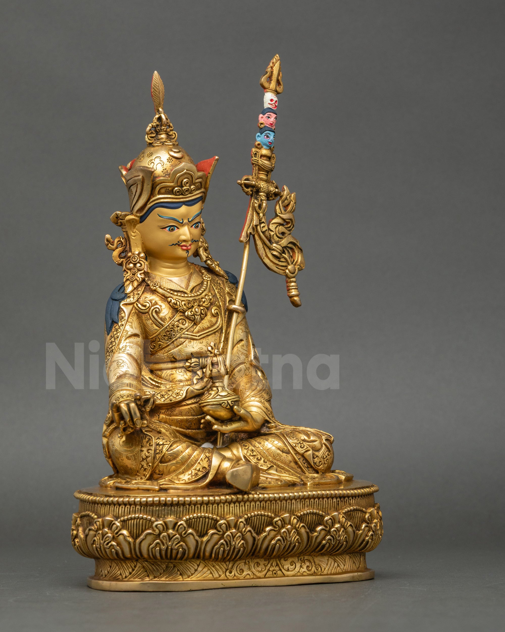 Guru Rinpoche Statue detailed close up face, Padmasambhava fierce expression, fire-gilded gold copper Himalayan Buddhist artwork