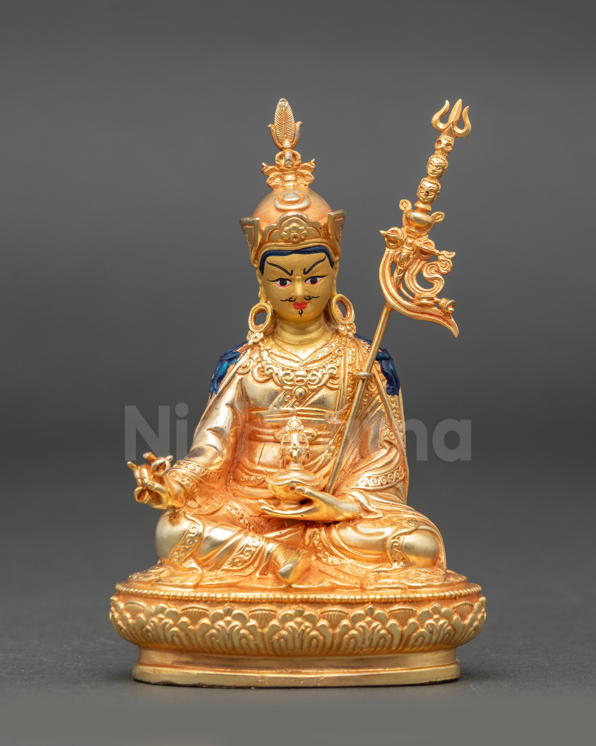 Guru Rinpoche Statue front view gold fire-gilded face seated on lotus with vajra and kapala