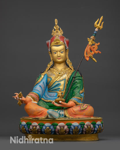 Guru Rinpoche Statue front view seated on lotus pedestal with gold-gilded ornaments
