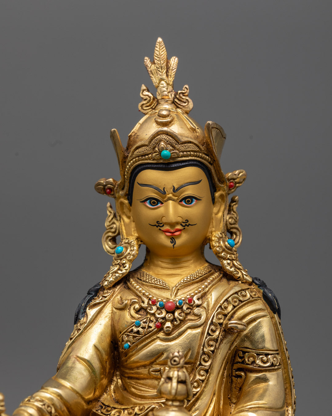 Guru Rinpoche Statue holding vajra and elixir vase, crafted with fire-gilded golden copper