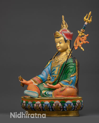 Guru Rinpoche Statue left side view showing kasaya robes and intricate carving