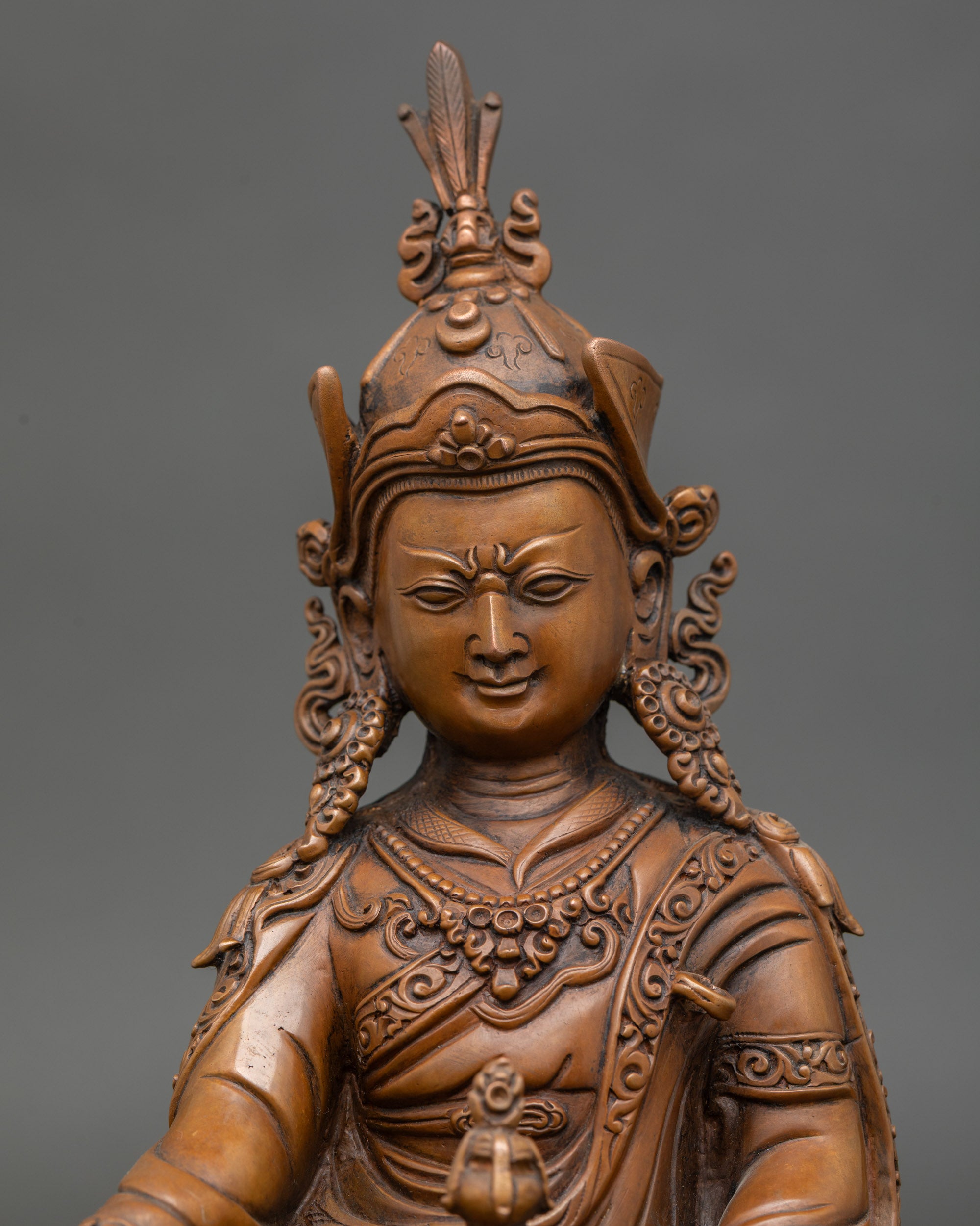 Guru Rinpoche Statue regular close up showing robe and lotus seat details