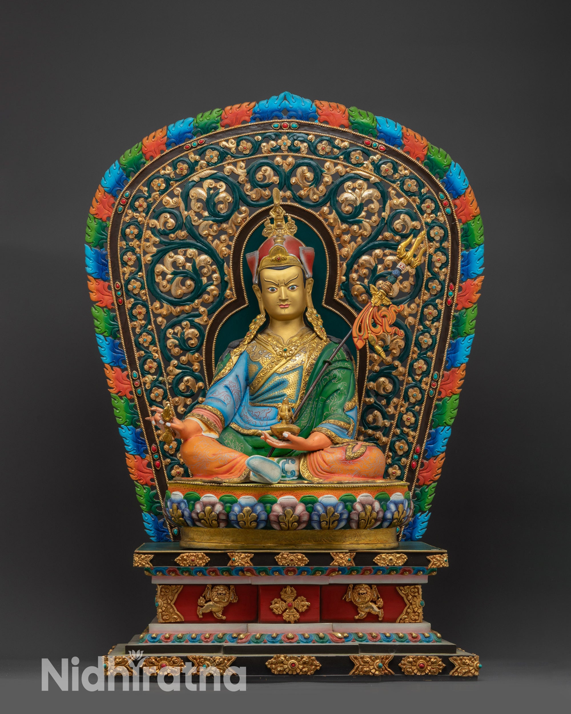Guru Rinpoche on Lion Throne front view with gold gilding and multi-colored lotus pedestal
