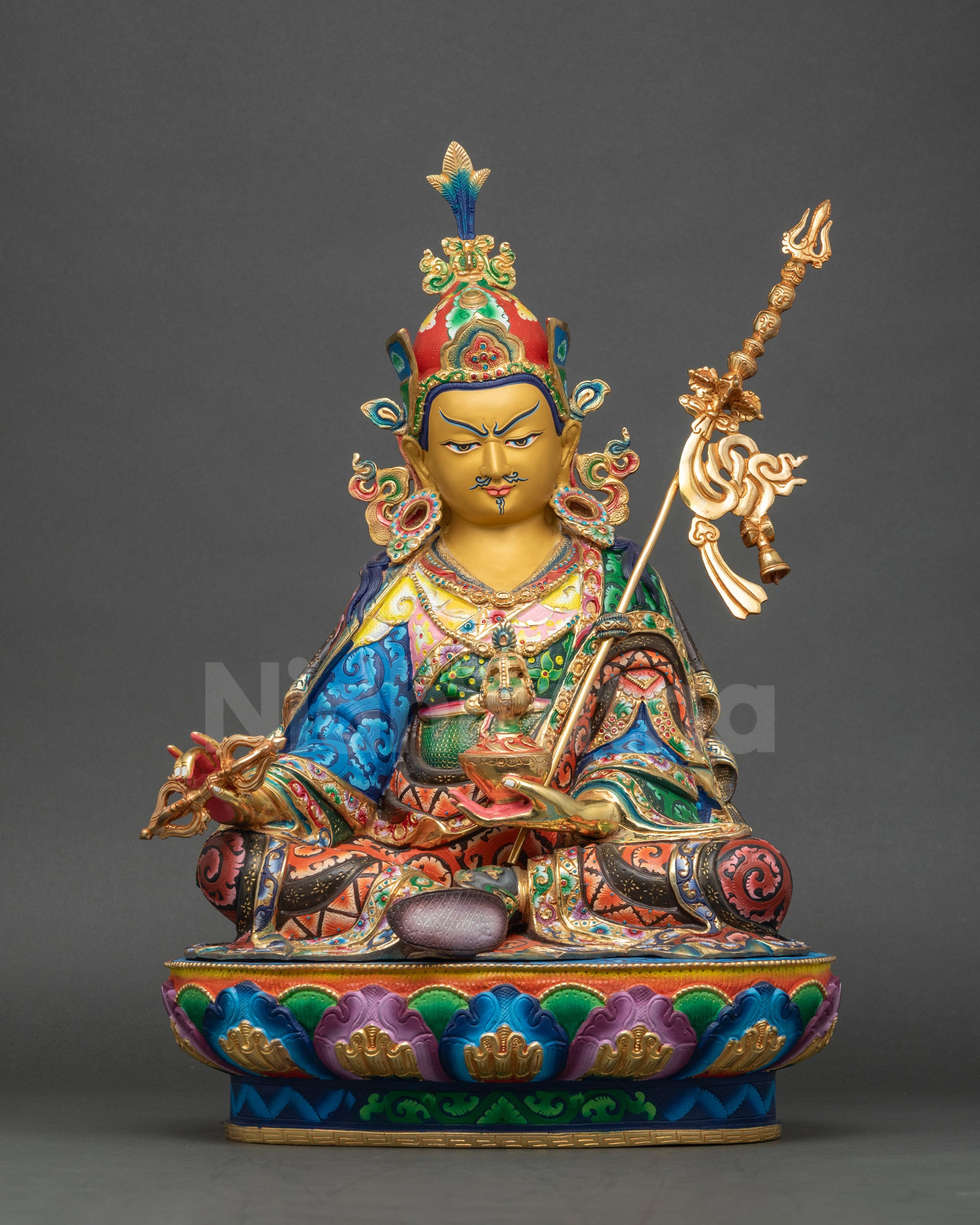 Guru Rinpoche statue front view showing full posture and lotus seat