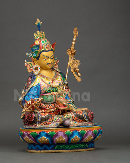 Guru Rinpoche statue left side view showcasing intricate floral motifs