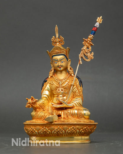 Guru Rinpoche statue seated on a lotus, fire-gilded 24K gold, handcrafted in Patan, Nepal