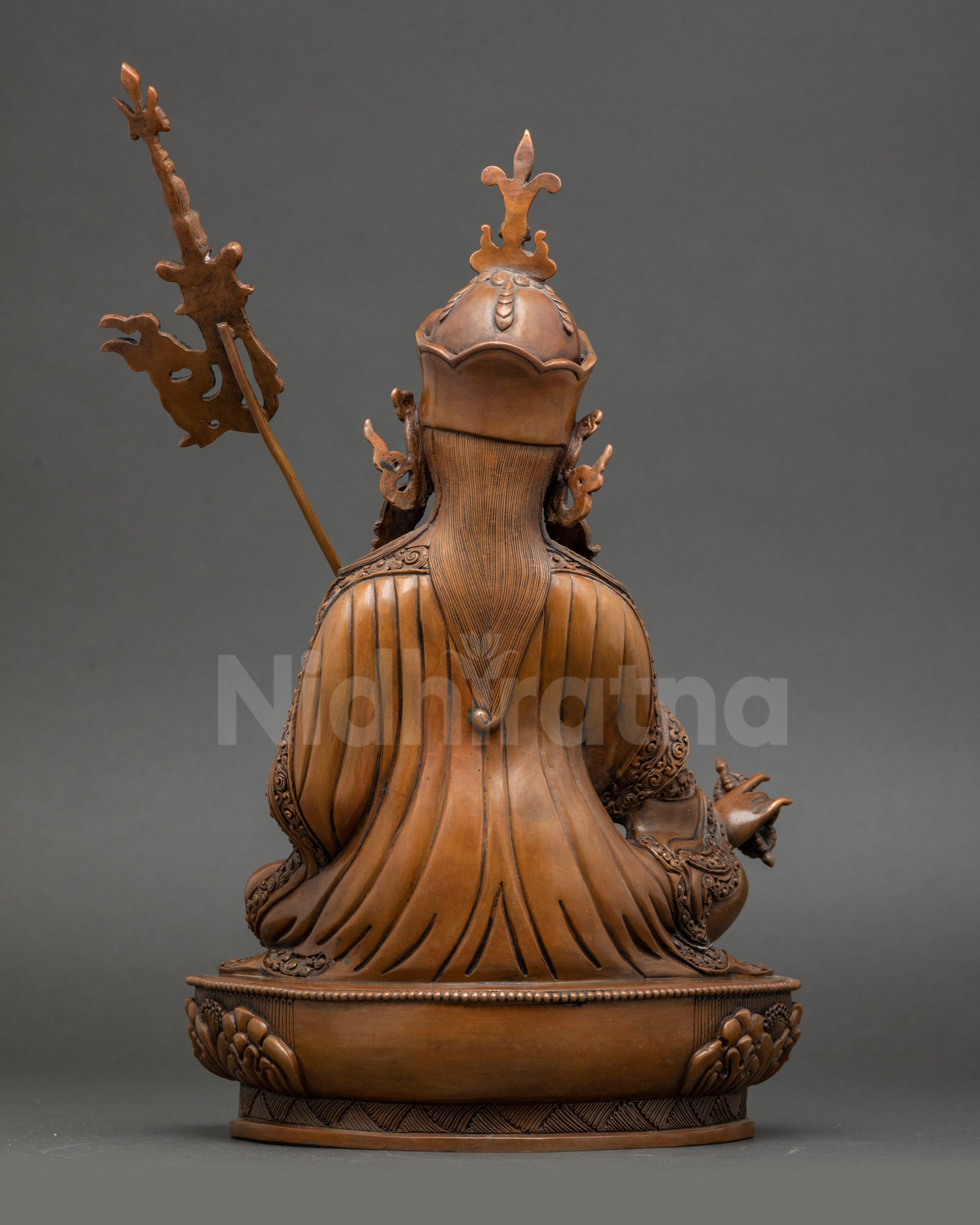 Guru Rinpoche statue, trident detail, oxidized Himalayan Buddhist art