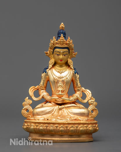 Hand-carved Amitayus Statue from Nepal with 24k gold-plated body seated on lotus base