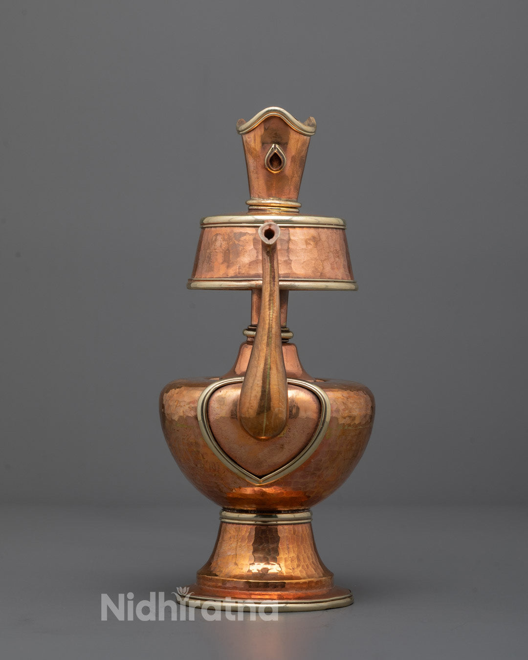 Hand-carved Chegumba made from premium copper, showcasing intricate traditional Tibetan