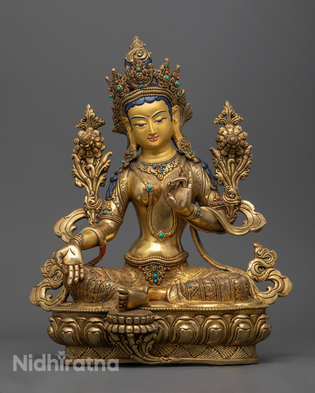 Hand-carved Green Tara Statue with a gold fire gilded finish, seated gracefully on a lotus throne.
