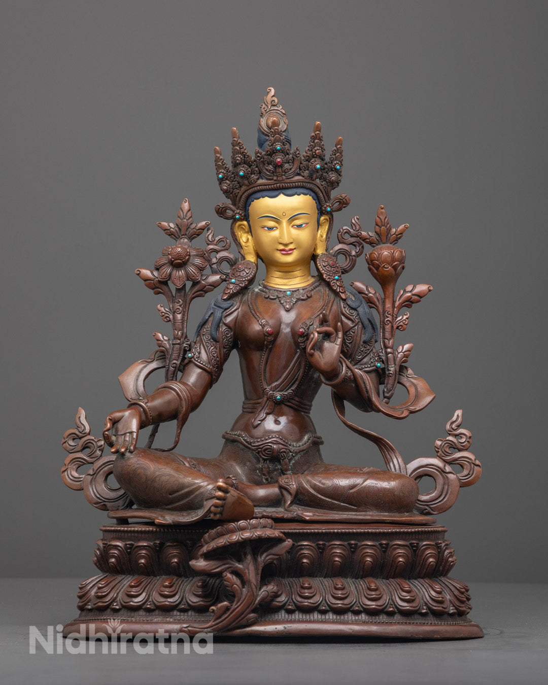 Hand-carved Green Tara statue with 24k gold-gilded face on lotus throne