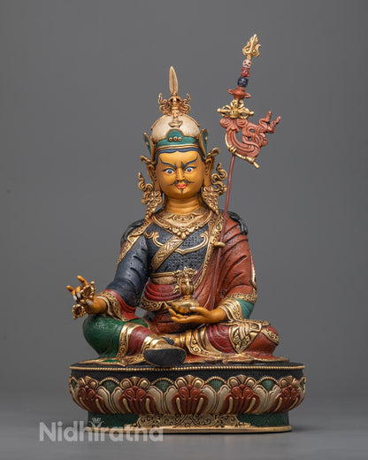 Hand-carved Guru Rinpoche statue with 24k fire-gilded gold on copper base, crafted by Nepali artisan