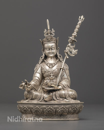 Hand-carved Guru Rinpoche statue with pure silver plating, crafted in Nepal using the lost wax method