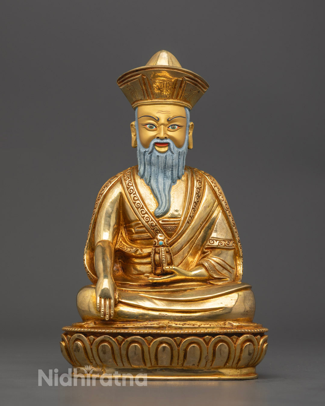 Hand-carved Guru Shapdum statue seated with vajra and lotus, showcasing intricate Tibetan Buddhist details and gold gilding.