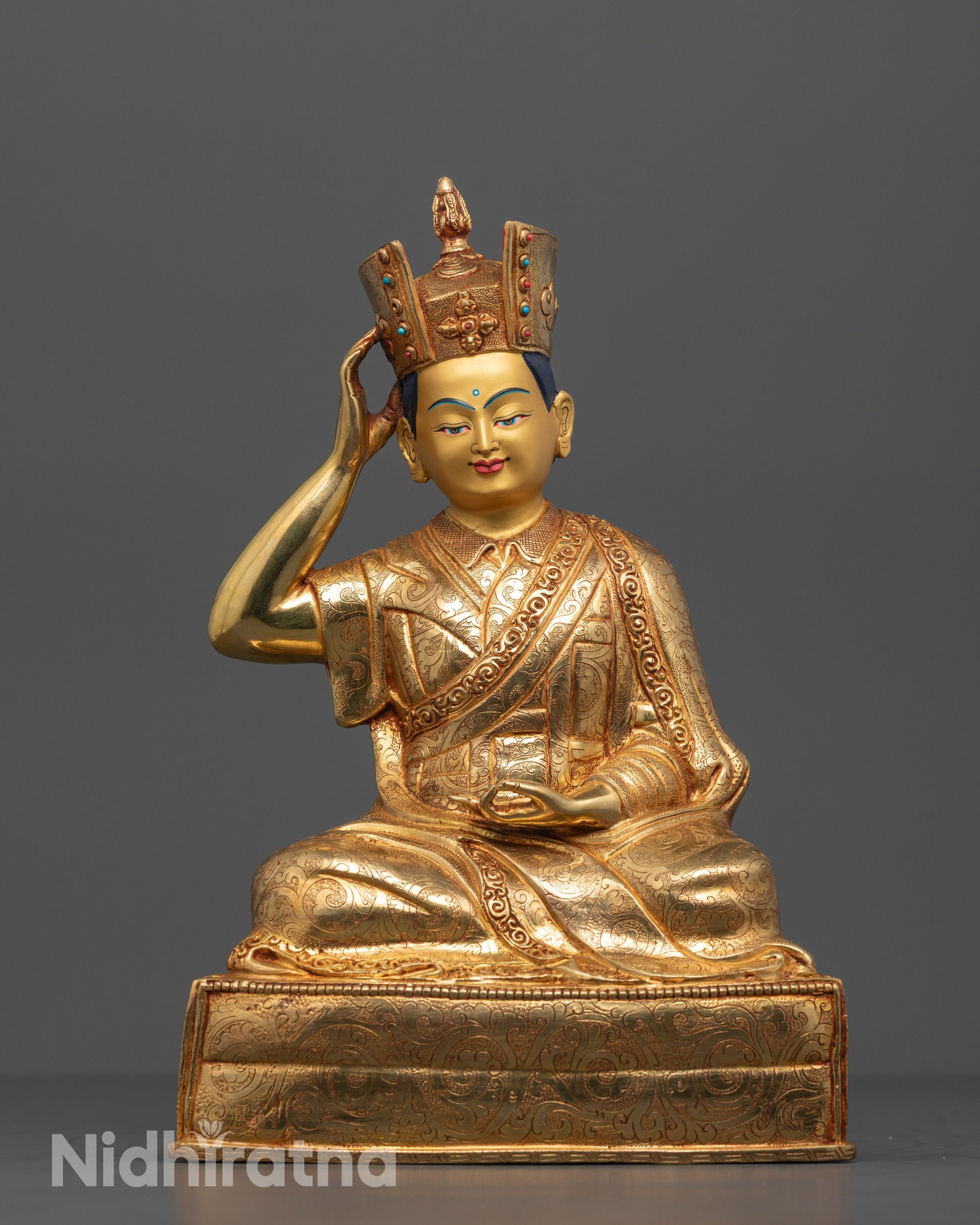 Hand-carved Karmapa Statue seated on a plain lotus base with 24k gold gilding