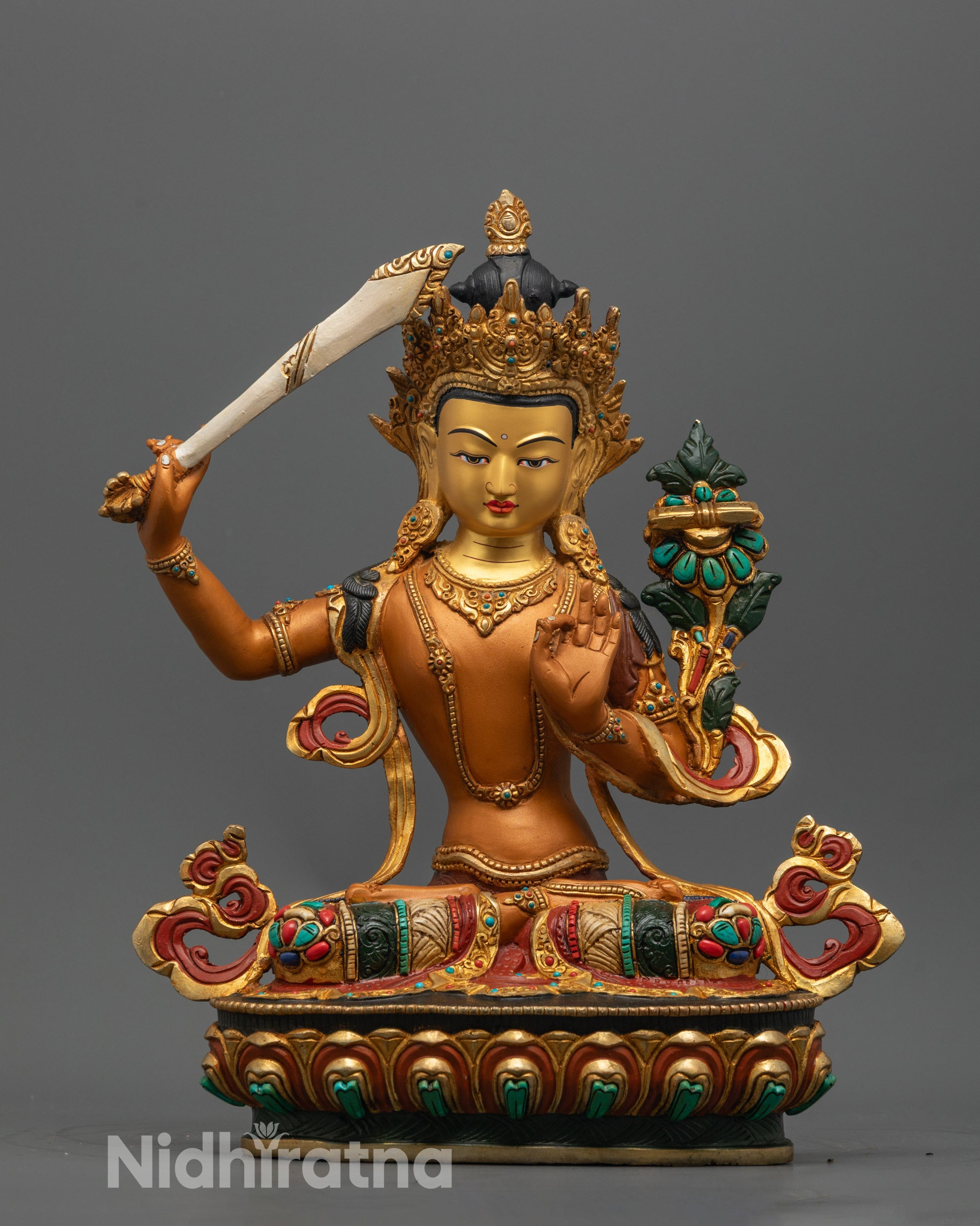 Hand-carved Manjushri Statue with 24k gold-gilded face and orange acrylic body