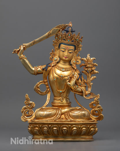 Hand-carved Manjushri statue with halo and sword, seated in meditative posture