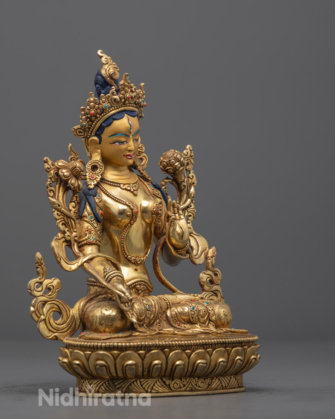 Hand-carved Manjushri statue with stone body seated on a lotus throne, featuring a hollow chamber for inserting mantras, crafted by a master artist from Nepal.