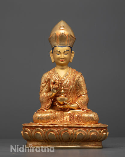 Hand-carved Nepalese Karmapa Statue with 24k fire gold gilding seated on lotus