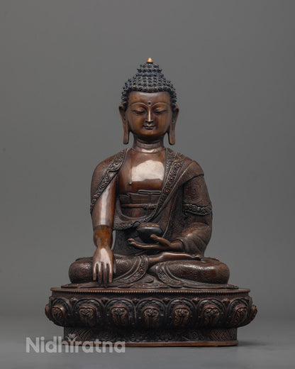 Hand-carved Shakyamuni Buddha Sculpture in oxidized copper seated on lotus base