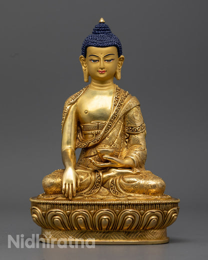 Hand-carved Shakyamuni Buddha Statue made of premium 24k gold gilded copper, showcasing intricate details and craftsmanship.