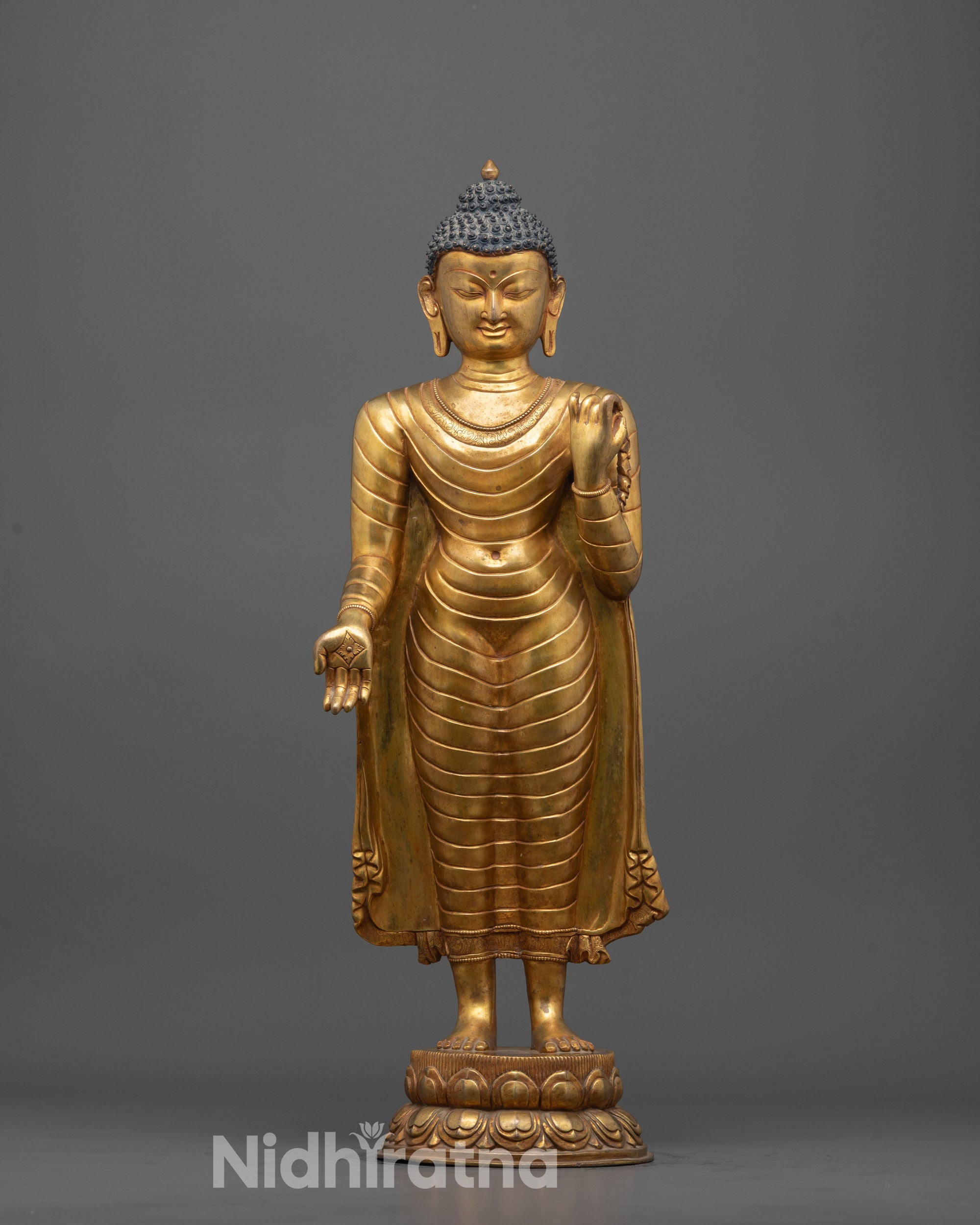 Hand-carved Standing Buddha Sculpture from Nepal with 24k gold plating