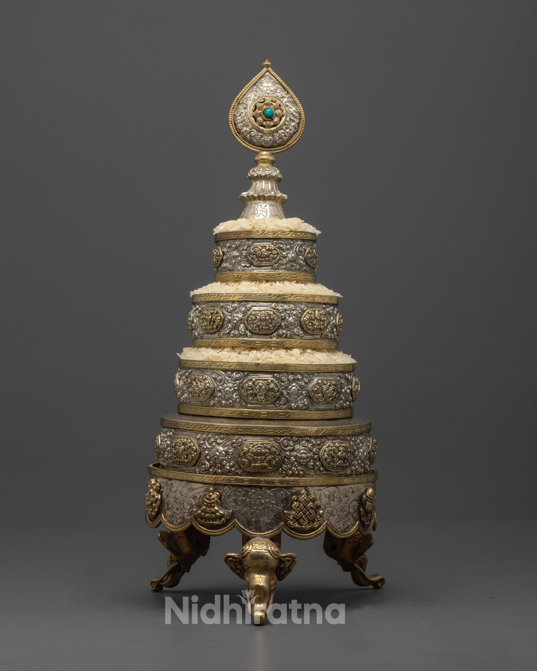 Hand-carved Tibetan Ratna Mandala with silver plating and intricate jewel details