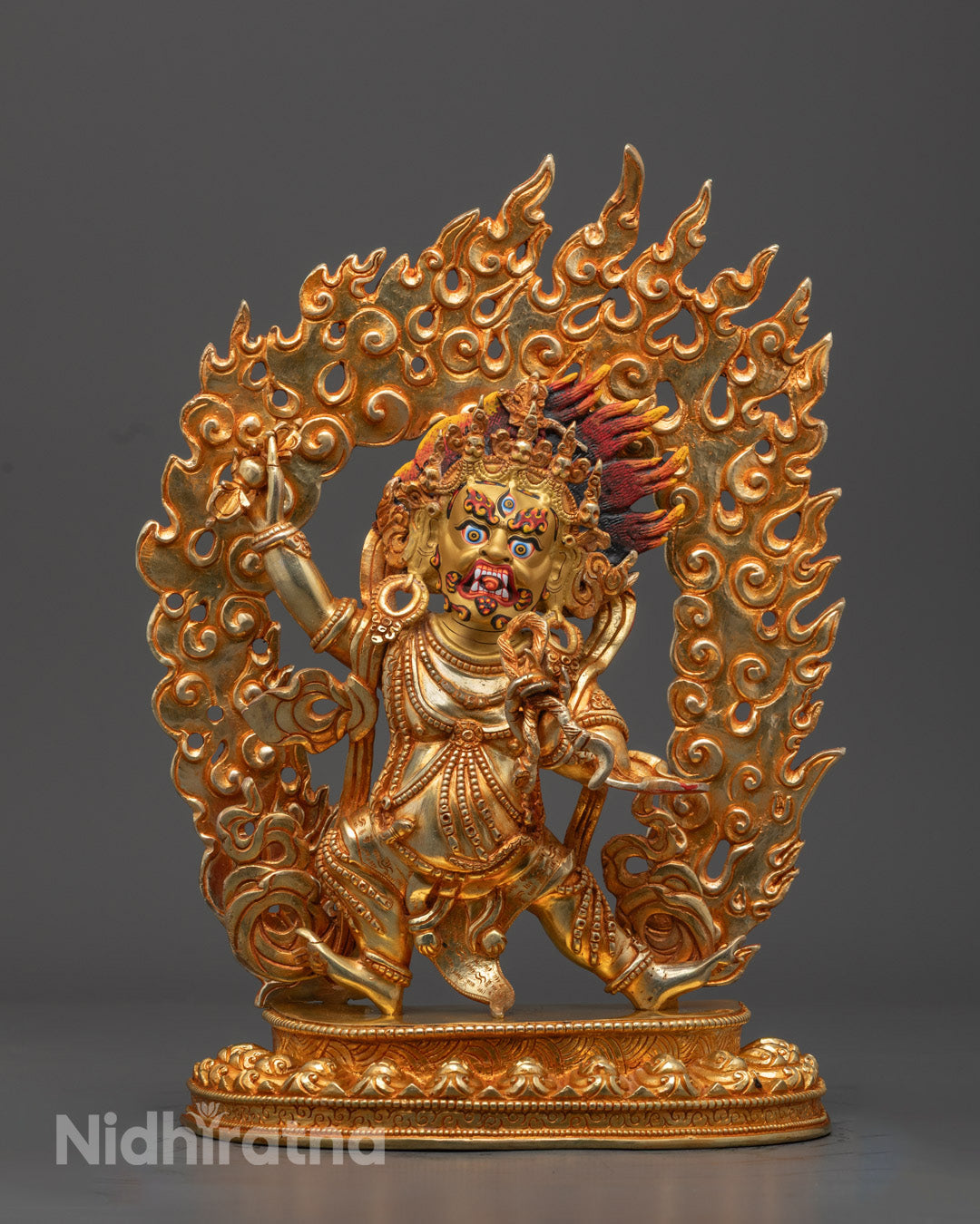 Hand-carved Vajrapani statue in deep blue, standing in wrathful pose with tiger silk cloth and 24k fire-gilded copper finish.