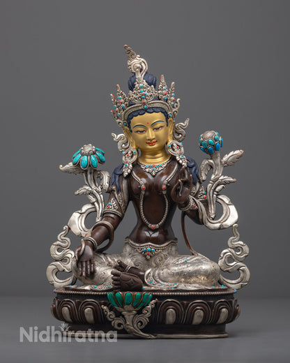 Hand-carved oxidized copper Green Tara statue with silver-plated finish and 24k gold-gilded face, adorned with semi-precious stones.