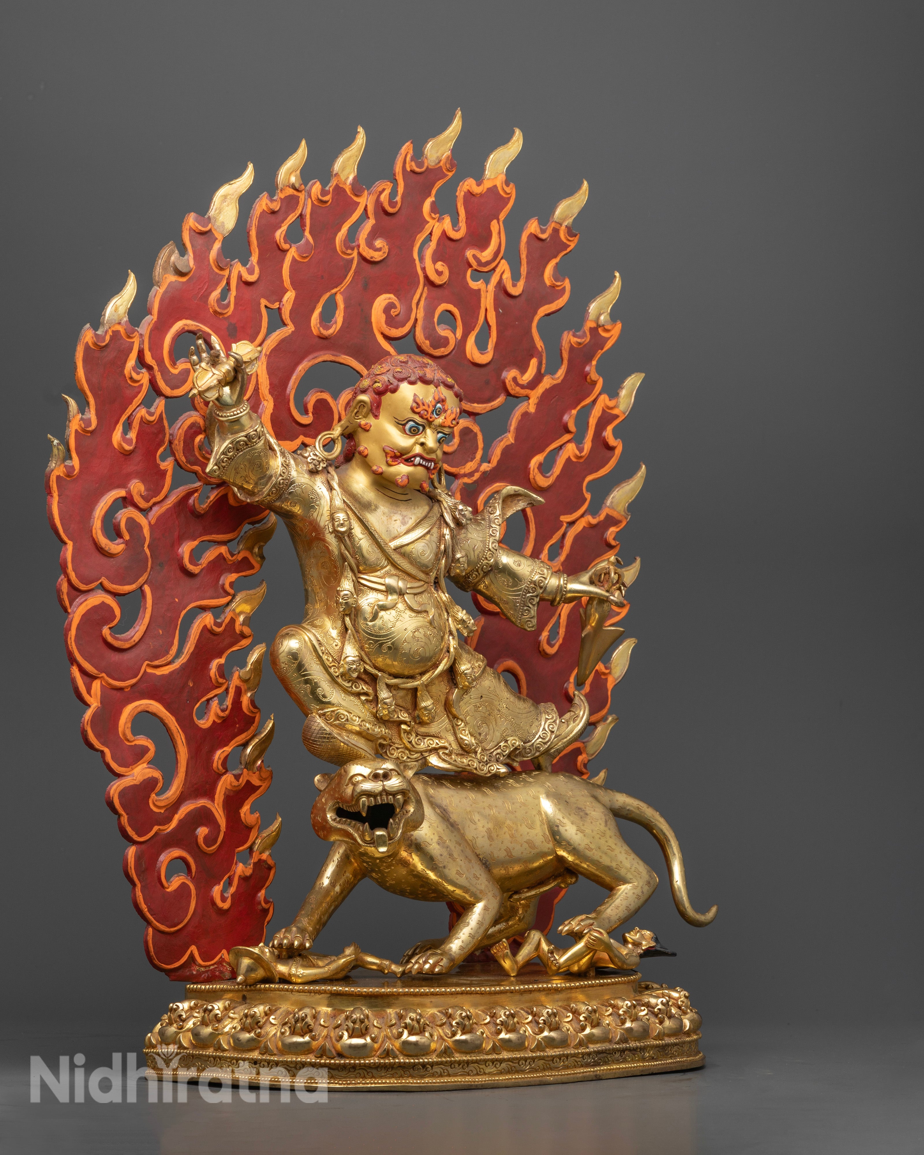 Hand-painted Dorje Drolo statue with vibrant acrylic colors, representing Padmasambhava’s fierce manifestation for spiritual protection.