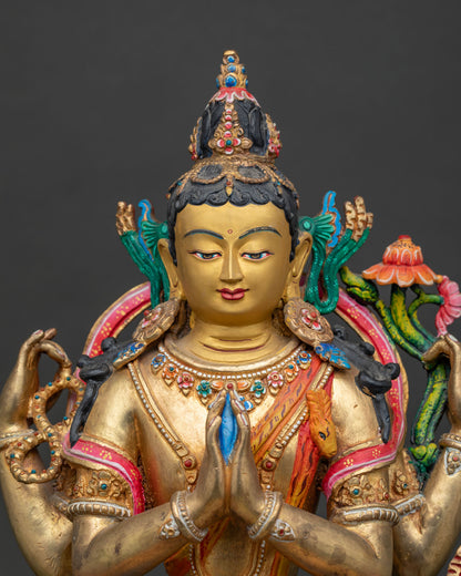 Handcrafted Nepalese Four-Armed Chenrezig Statue with gold-painted face.