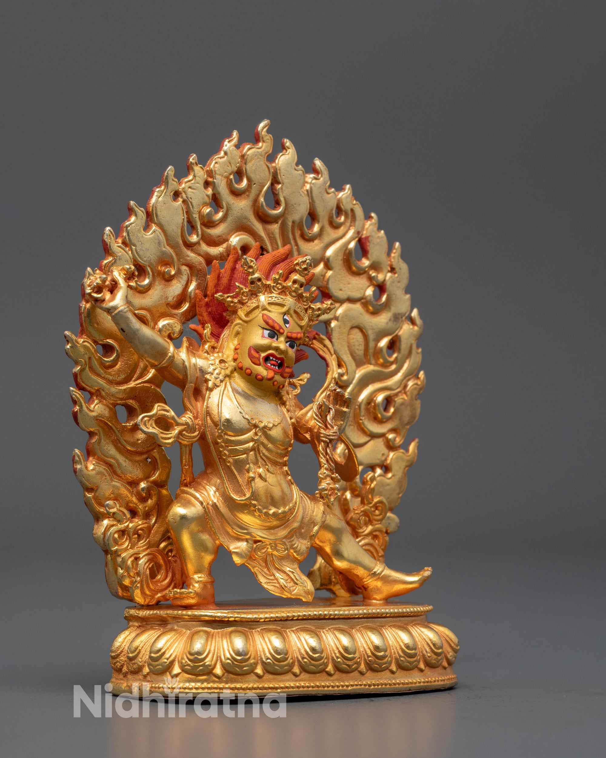 Handcrafted 24k gold gilded Vajrapani Bodhisattva sculpture seated on a lotus base