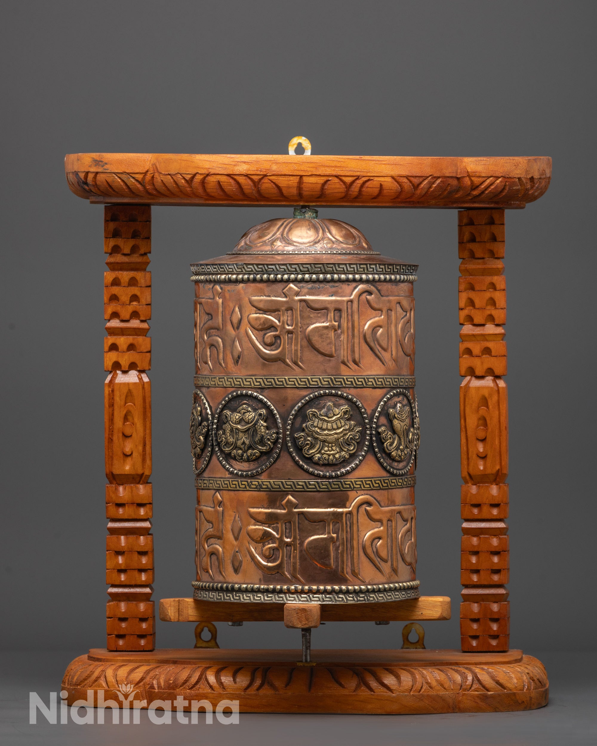 Handcrafted Ashtamangala Prayer Wheel with copper and brass on carved wooden frame
