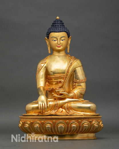Handcrafted Buddha statue from Nepal, gold fire-gilded copper with lotus seat
