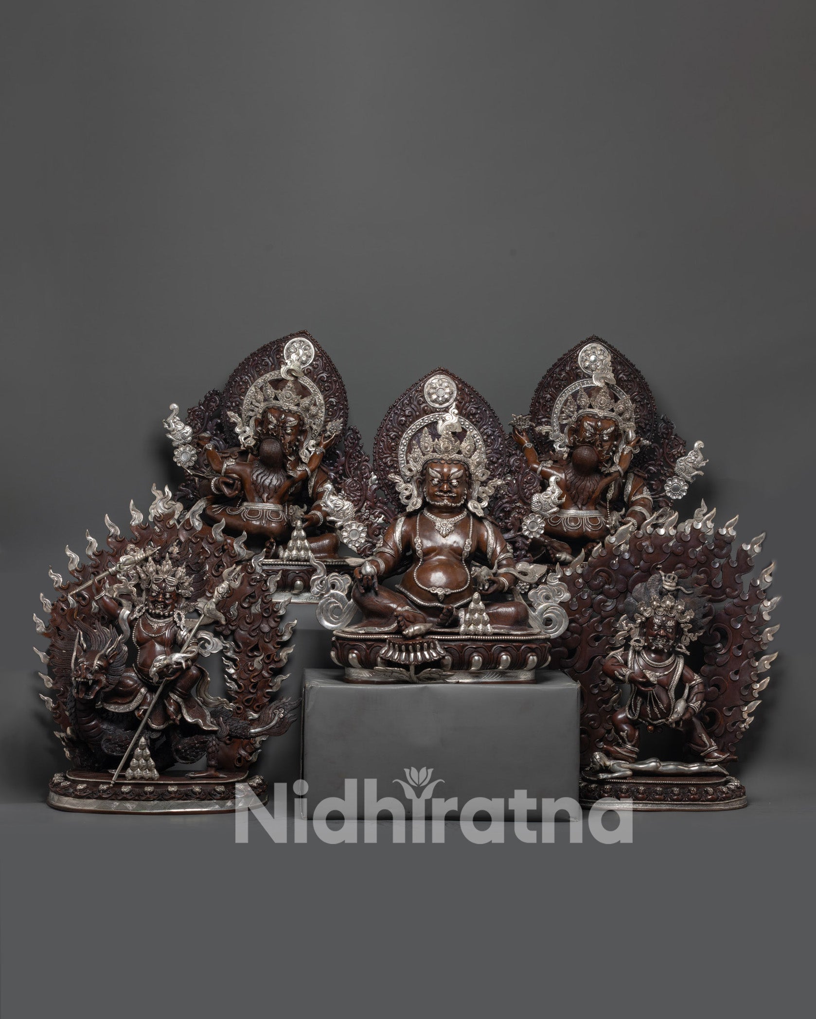 Handcrafted Five Dzambhala statue set for prosperity and protection.