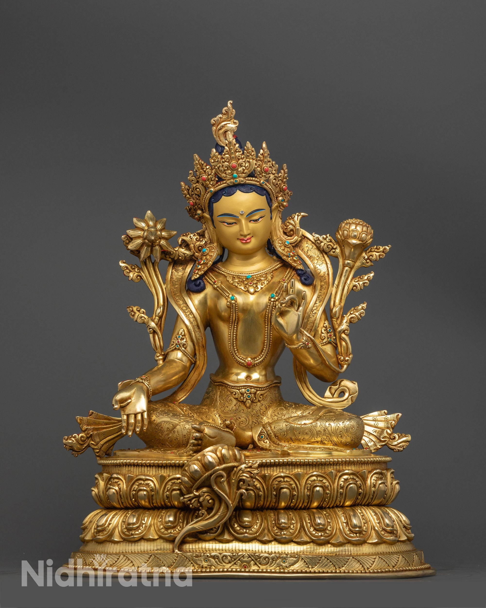 Handcrafted Green Tara Statue seated on a double lotus base with 24k gold gilding